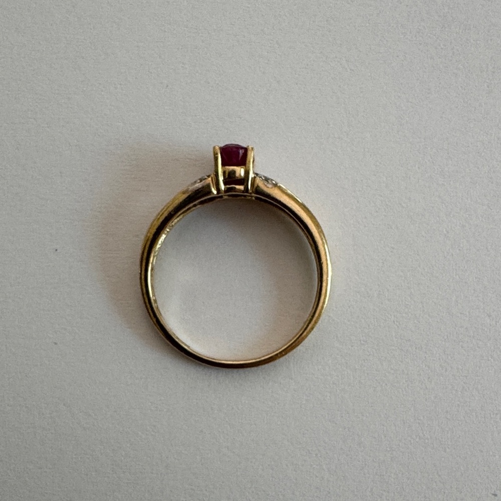 Gold and garnet ring